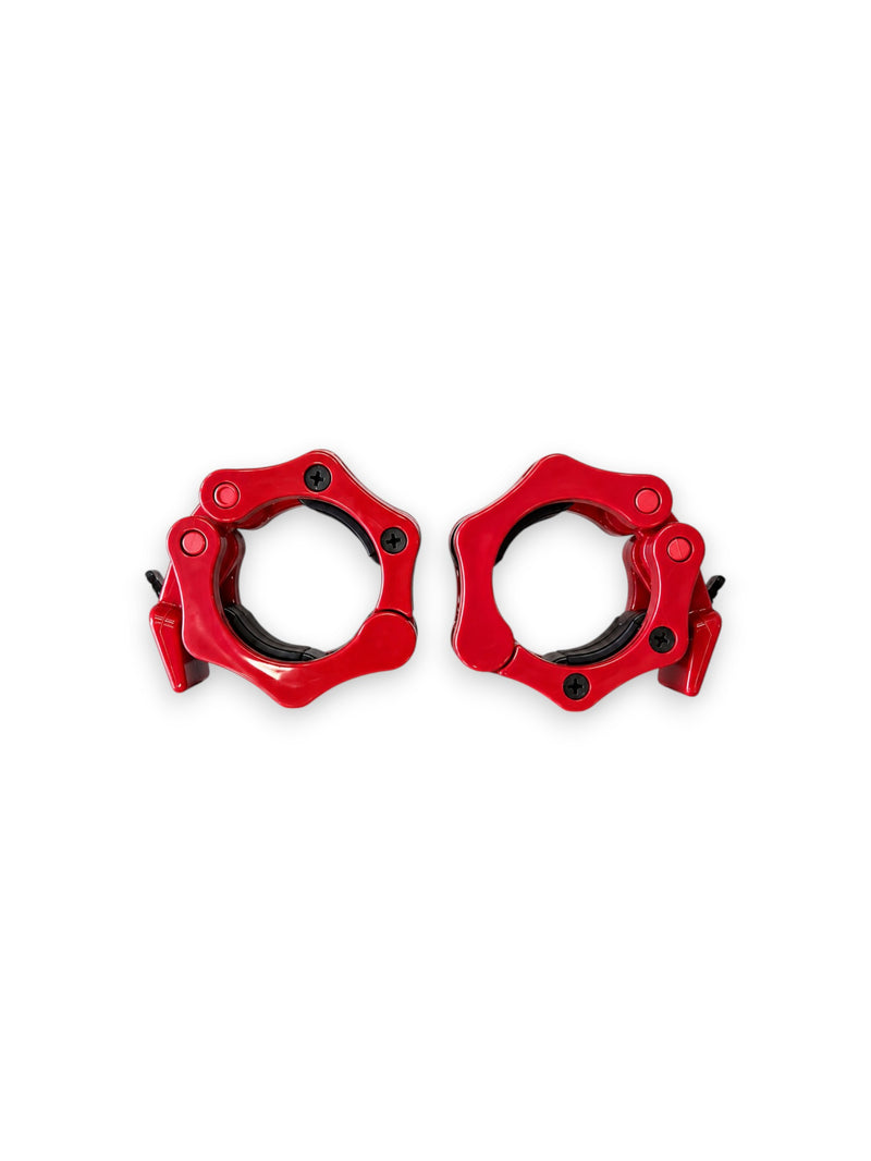 A pair of Fitness Canada heavy-duty 2 inch Olympic plastic quick-release barbell collars with inner rubber grip pads shown in red, isolated on a white background as seen in image.