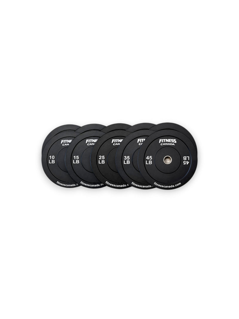 260LBS of Fitness Canada black rubber bumper plates with a stainless steel center ring and crisp white brand lettering. Includes pairs of 10, 15, 25, 35, and 45lb black bumper plates.