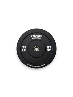 A single 35 LB Fitness Canada black rubber bumper plate with a stainless steel center ring and crisp white brand lettering, isolated on a white background as seen in image.