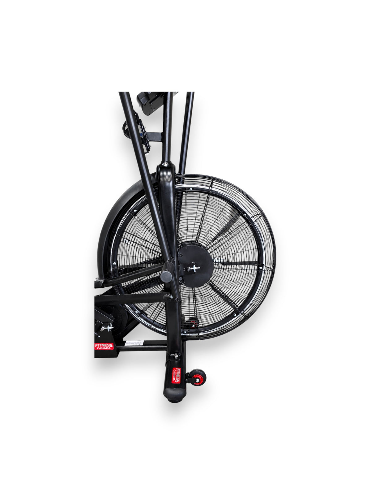 Close-up view of the Fitness Canada air bike large front steel fan wheel.