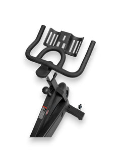 Close up view of the black Fitness Canada Cycling Spin Bike featuring multi-grip height adjustable handlebars, top down adjustable resistance knob, and front wheels for easy transport